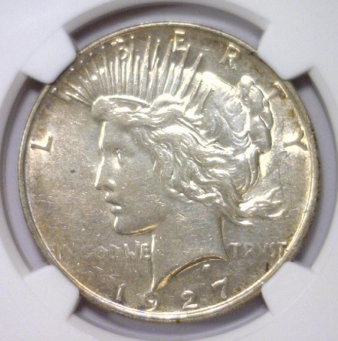 1927-D Peace Silver Dollar NGC AU details (1 of 3)