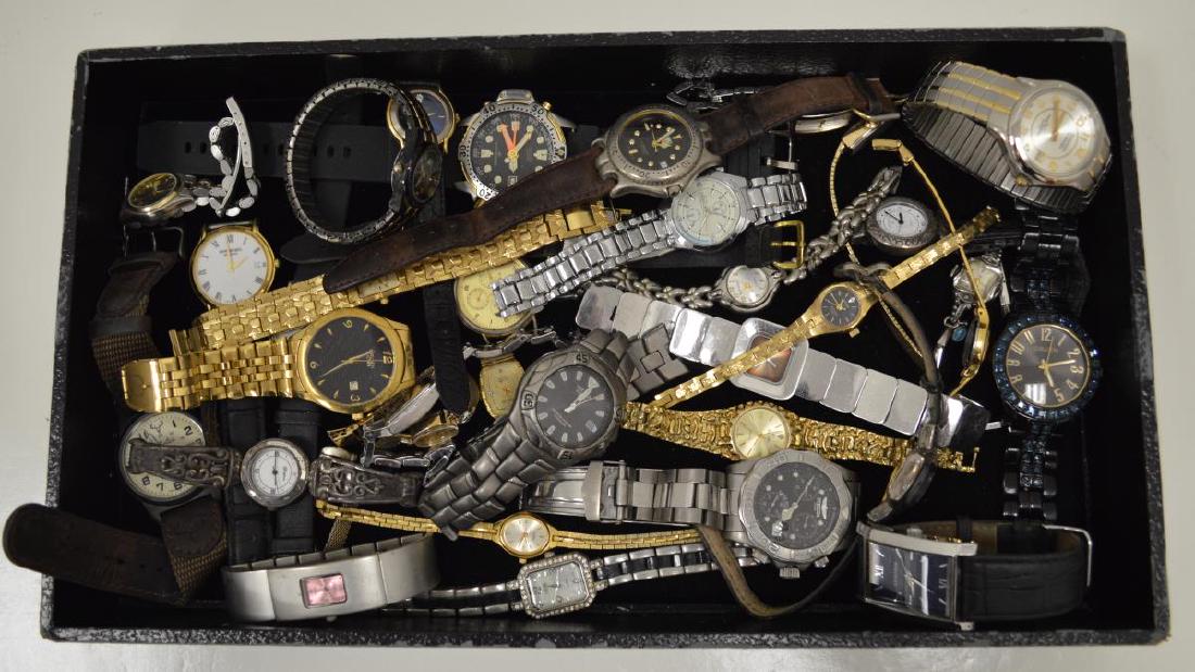 Large lot of watches: Large lot of men's and ladies watches. Makers including Brighton, Citizen, Gruen, Invicta, and more. Watches are in various conditions and no guarantee to be in working order.