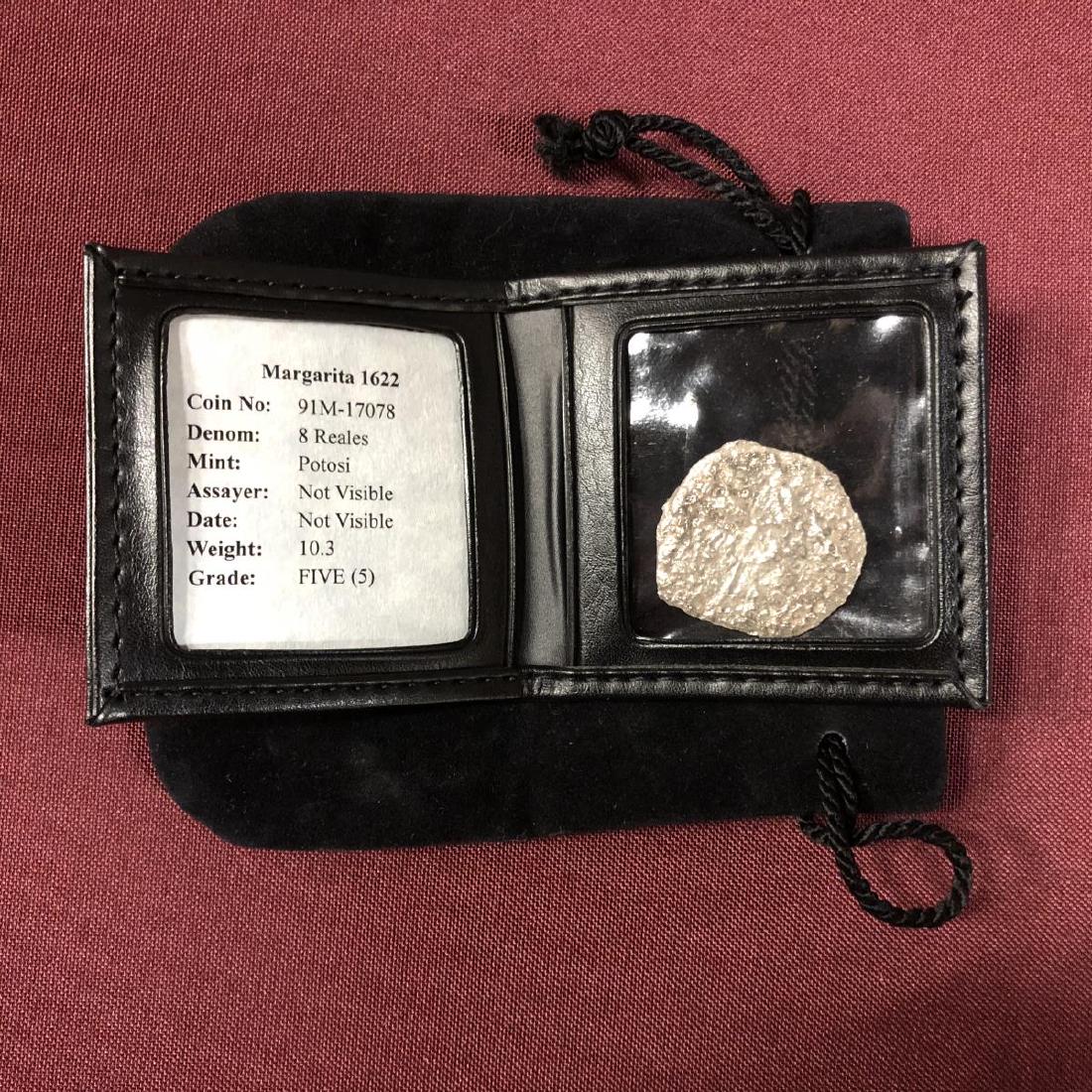 Margarita Shipwreck Coin 8 Reales Mel Fisher COA: Margarita Shipwreck Coin 8 Reales Mel Fisher with COA. Authentic famous shipwreck coin recovered by Mel Fisher. This coin is a Grade 5 from the Potosi Mint and is from the ruler King Philip III, from 