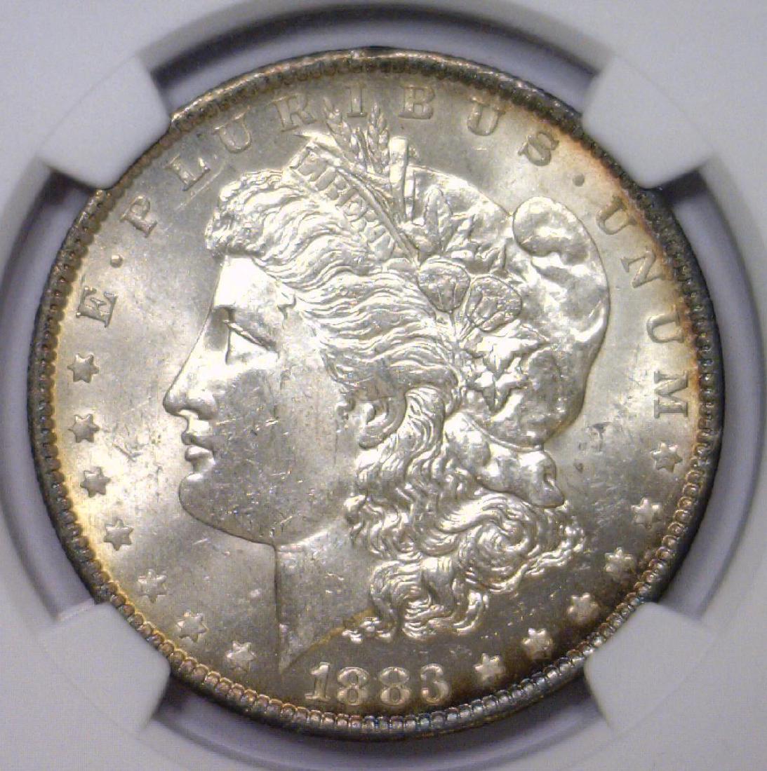 1883-O Morgan Silver Dollar NGC UNC det. obv clnd (1 of 3)