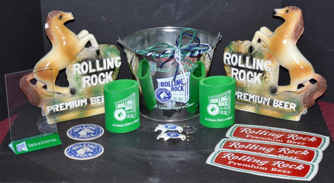 Rolling Rock Beer Bookends, Ice Bucket, Coozies: Collection of Rolling Rock beer collectibles. Bookends, Ice Bucket, Bottle Opener, Stickers, Coasters, Table Advertisement, Beer Coozies. Man Cave decorator pieces. The bookends have slight damage and