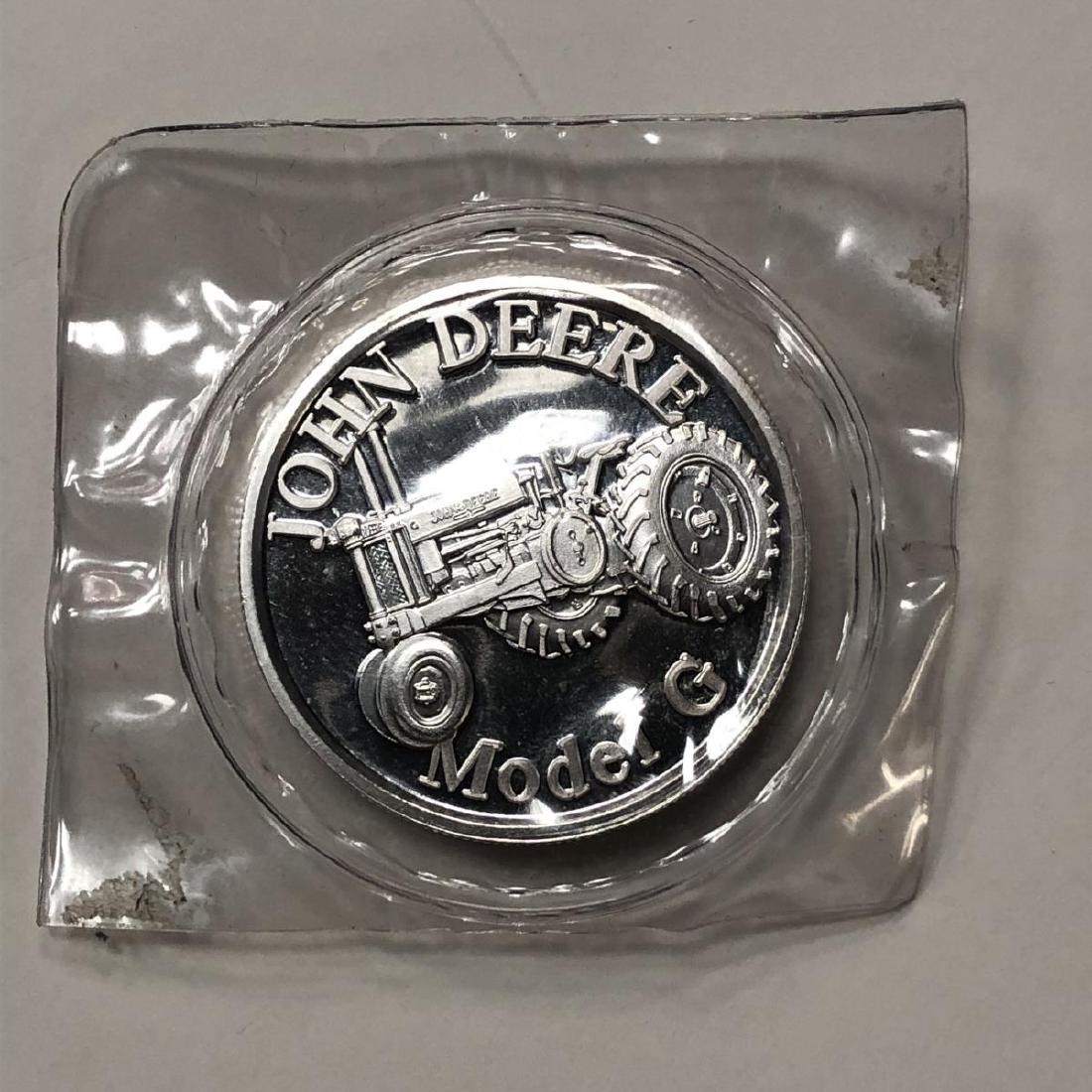 John Deere Tractors Model G .999 Silver Medal 1 oz: John Deere Tractors Model G .999 Silver Medal 1 oz. Still sealed in its plastic.