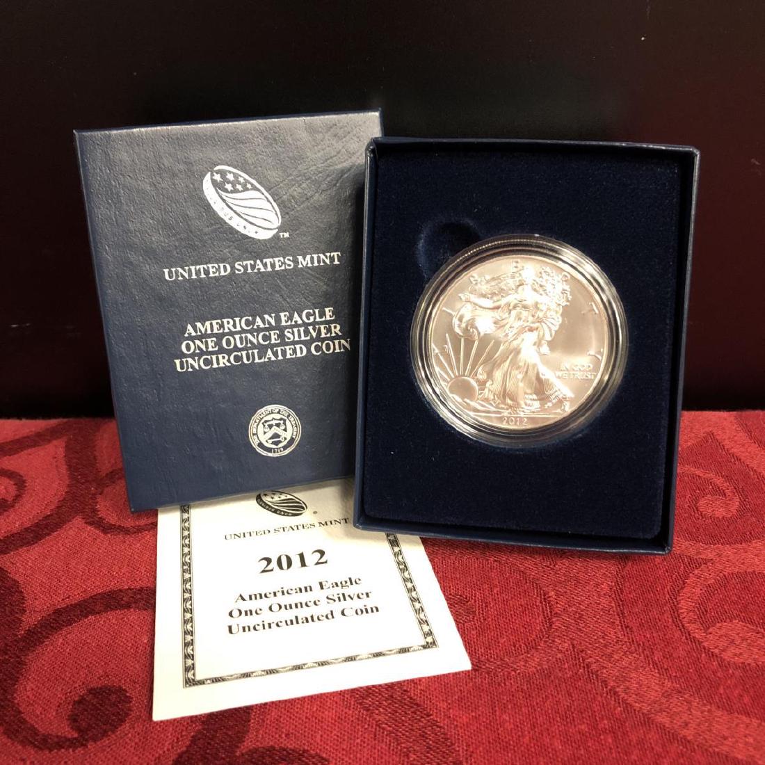 2012-W Burnished Silver Eagle w/Box, Pouch & COA (1 of 3)