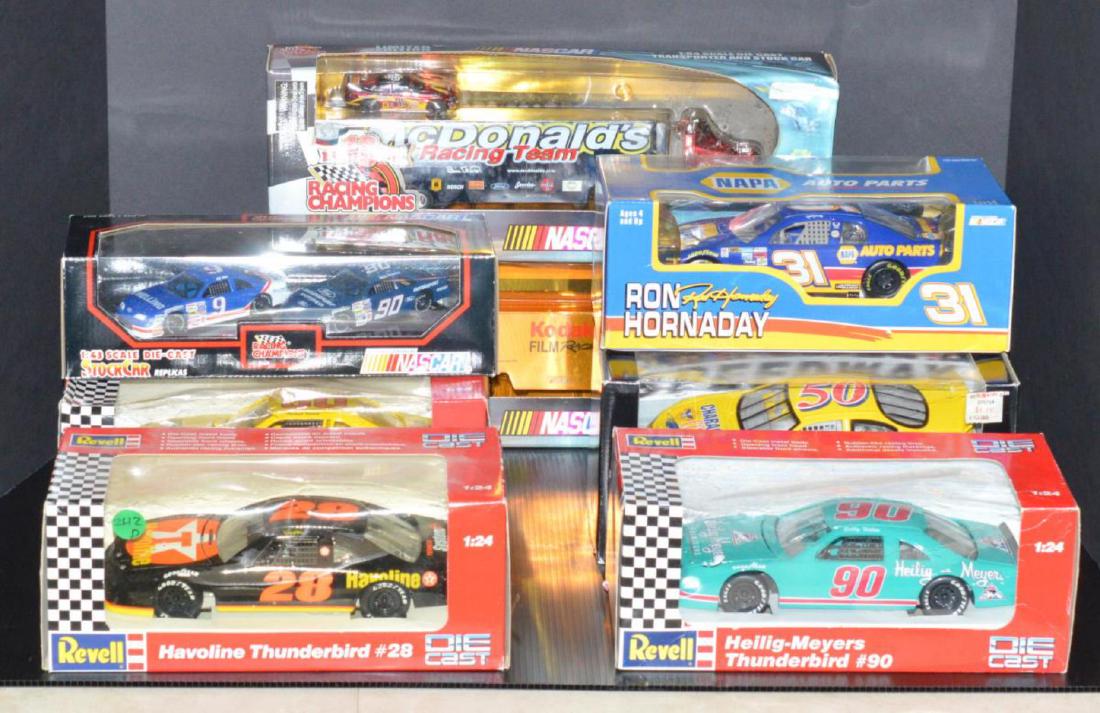 Lot of 8 Boxed Race Car Scale Toys Revell Action: Lot of 8 Boxed Race Car Scale Die Cast Toys by Revel & Action & Team Hot Wheels & Racing Champions. Pair of Racing Champions tractor trailers with cars Kodak & McDonalds both 1:64 scale. Racing Champi