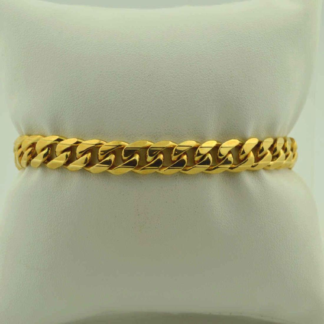 14kt y/g 8" Cuban link bracelet: 14kt yellow gold 8" Cuban link bracelet. Weight 36.4gr. Width 9mm.