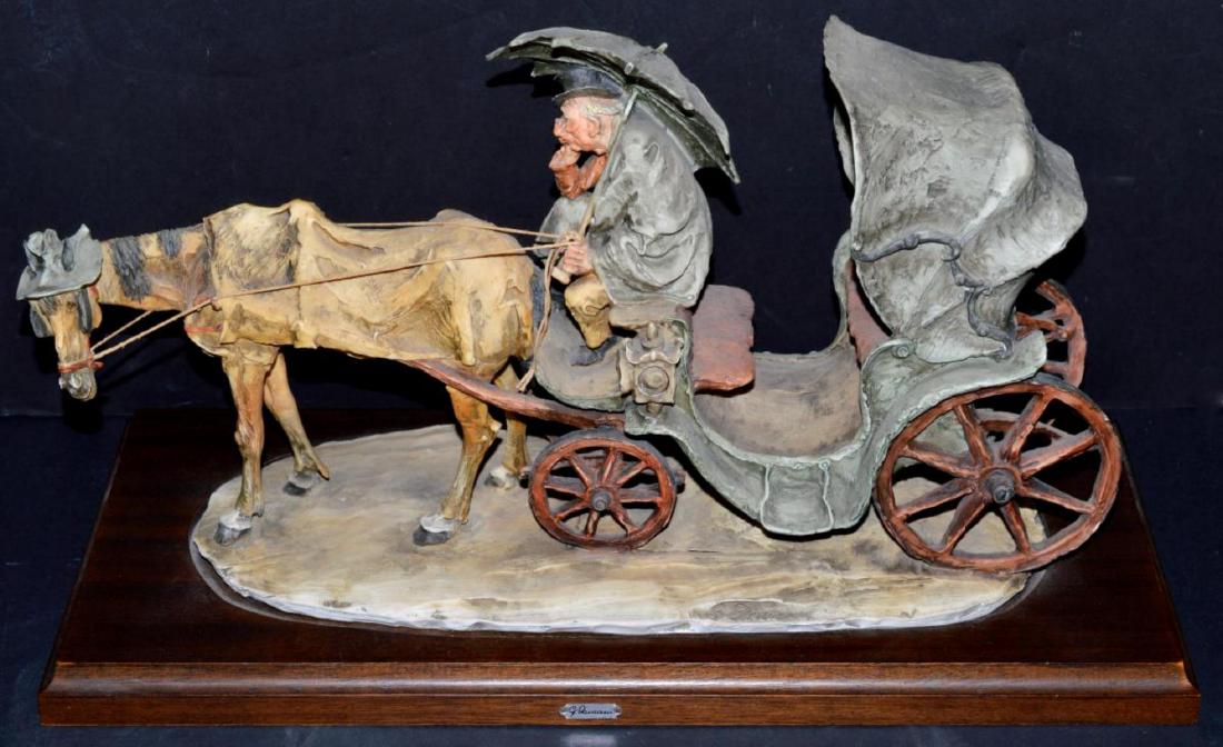 Armani Figurine Capodimonte Old Man Driving Buggy: Hard to Find Vintage Giuseppe Armani Capodimonte Figurine Titled "Old Man Driving Buggy". Features a horse drawn carriage buggy driven by an old man holding an umbrella. #130/750. Base Size: 18 1/2"x8