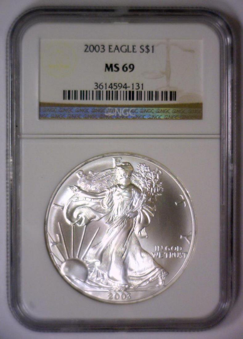 2003 Silver American Eagle NGC MS69: 2003 Silver American Eagle NGC MS69. This one-ounce .999 fine silver coin is the iconic silver bullion coin known world-wide. This one is lustrous and in Brilliant Uncirculated condition.