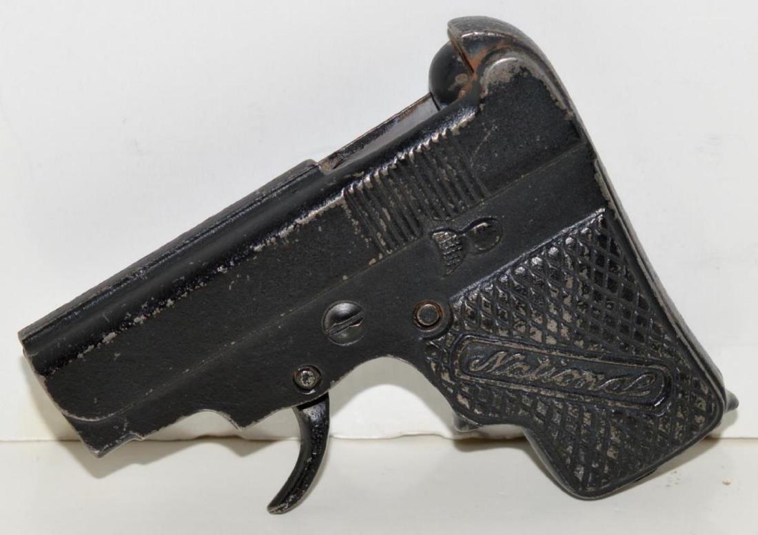 National Starter & Blank Toy Pistol USA Vintage: National Starter & Blank Toy Cap Pistol U.S.A. made, vintage early 1900's cast iron. Dick Tracy or Baby Browning styled, no trigger guard. Good condition old collectible toy.