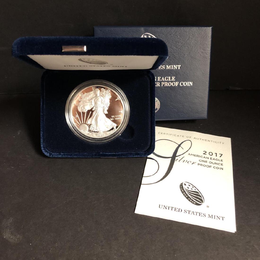 2017 Silver American Proof Eagle with Box & COA: 2017 Silver American Proof Eagle with Box & COA. This one ounce .999 fine iconic silver coin has deep mirrored fields and frosty cameo devices. Comes with its blue box of issue and COA.