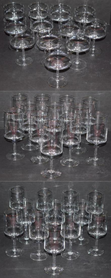 36 Pieces Lenox Rapture Platinum Rimmed Glasses: 36 Pieces Lenox Rapture (1965-1981) Clear with Platinum Rimmed Crystal Stemware Glasses. This Trio of 12 Each Set Consists of: Champagne/Tall Sherbet (5"), Wine Glass (6 1/4") & Water Goblet (7"). No 