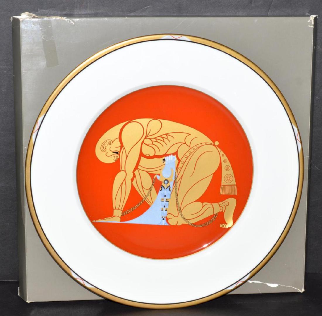 Erte Boxed Collector Plate of Samson and Delilah: Erte Boxed Collector 1987 Plate of Samson and Delilah. Bone china made in Japan #A3254. It has a depiction of Sampson bound in chains & Delilah in a blue gown. It is marked with a stylized Erte on the