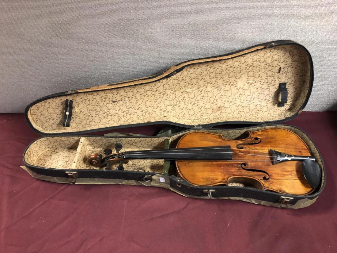Vintage Violin in Case Stradivarius Md of 1733 4/4: Vintage Antonius Stradivarius Copy Full Size Violin in Case. Model of 1733. The 14" body "full size" is in good playable condition but has some cracks that travel through the "f" holes. The black tail