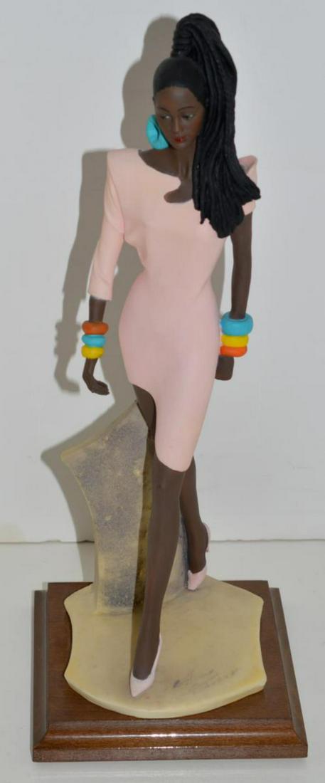 Whitney African American Figurine Vittorio Tessaro: Whitney African American Figurine A.D.L. Signed by Vittorio Tessaro. Size: 14" H. Sculpture of a self-confident African beauty with a natural erotic aura. Hand-crafted in Italy from crushed Carrara ma
