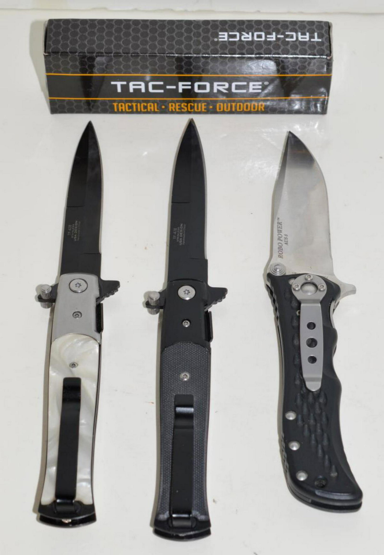 Camillus Heat Robo Power Aus 8 Spring Assist Knife: Three Spring Assist Knives. Camillus Heat Robo Power Aus 8 Spring Assist Knife in Zombie Coffin Zipper Case. The extended tang & spring assist make for easy quick opening. It is 8" overall with a 3.5"