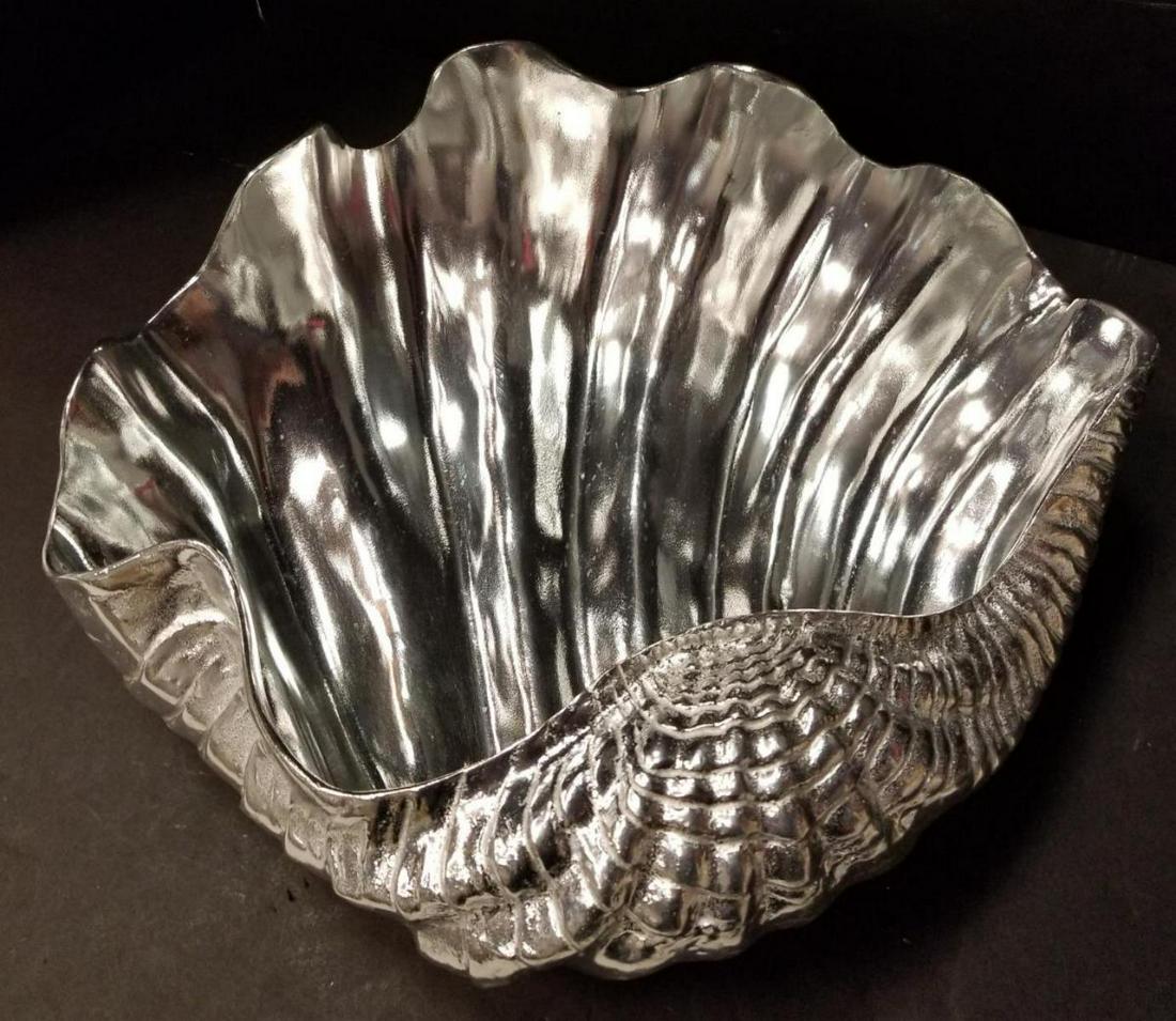 Giant Clam Shell Bowl by Arthur Court Designs 1026: 1988 Giant Clam Shell Console Bowl by Arthur Court Designs #1026. Comes with Original Box. Size: 17 1/2" W x 15 1/2" D x 7" H. The rippled exterior of this shell artfully displays the wavy pattern fou