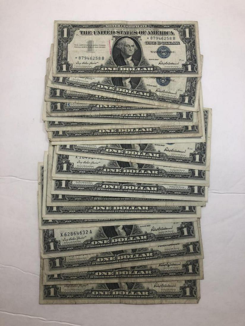 20-Pc Lot of 1957 $1 Silver Certificates G-AU: 20-Pc Lot of 1957 $1 Blue Seal Silver Certificates in good to About Uncirculated condition. A STAR note is noted, and about 6 of the notes are in AU condition. A decent starter "kit"!