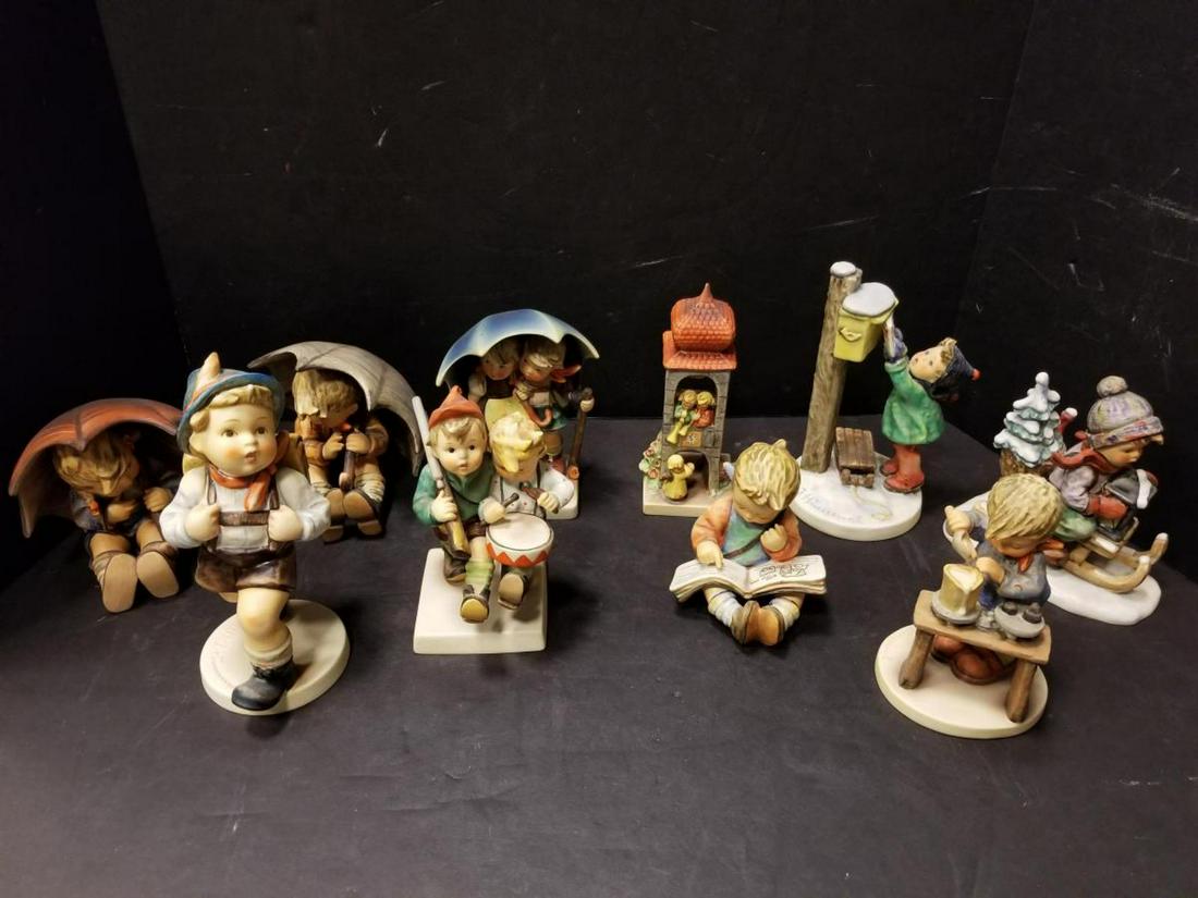 Large Lot of Goebel Hummel Figurines 11 Pieces: Large Lot of Goebel Hummel Figurines 11 Pieces Total. All are in good condition, W German made, hand painted statuettes. Including: Boys marching with long gun & drum 6.75" tall, Boy with sleigh at ma