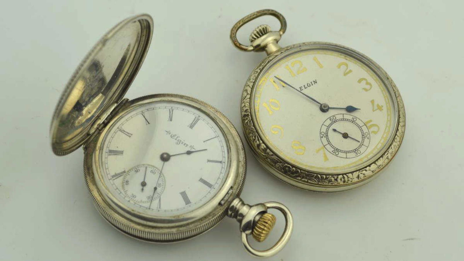 Pair of Elgin pocket watches (1 of 3)