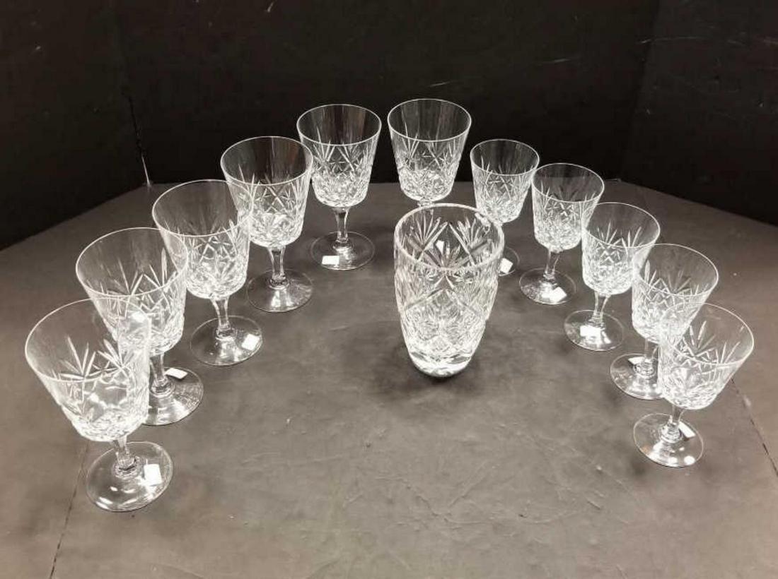 Large lot of Clear Cut Crystal Vase Goblets Wine: One Large Lot of Clear Cut Crystal Items Including a Vase Water Goblets & Wine Glasses. All have the same cross cut pattern & are in good condition. The 6 water goblets or glasses are 6.5" tall, 3.5" 