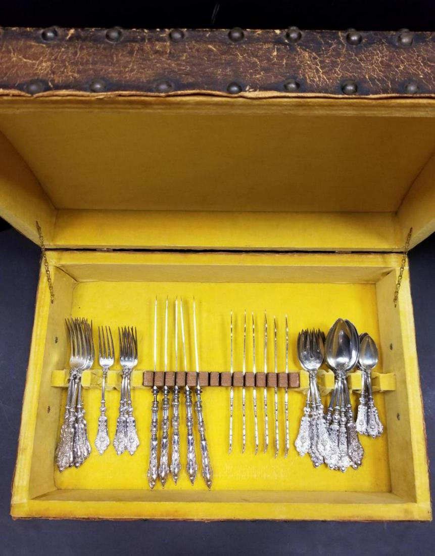 Bruckmann & Sohne German 800 Silver Flatware Set: Bruckmann & Sohne German 800 Figural Formal Dinner Silver Flatware Set #36, Pat. 1891. This wonderfully detailed set has a phenomenal raised relief reminiscent of Renaissance by Christofle. It has a t