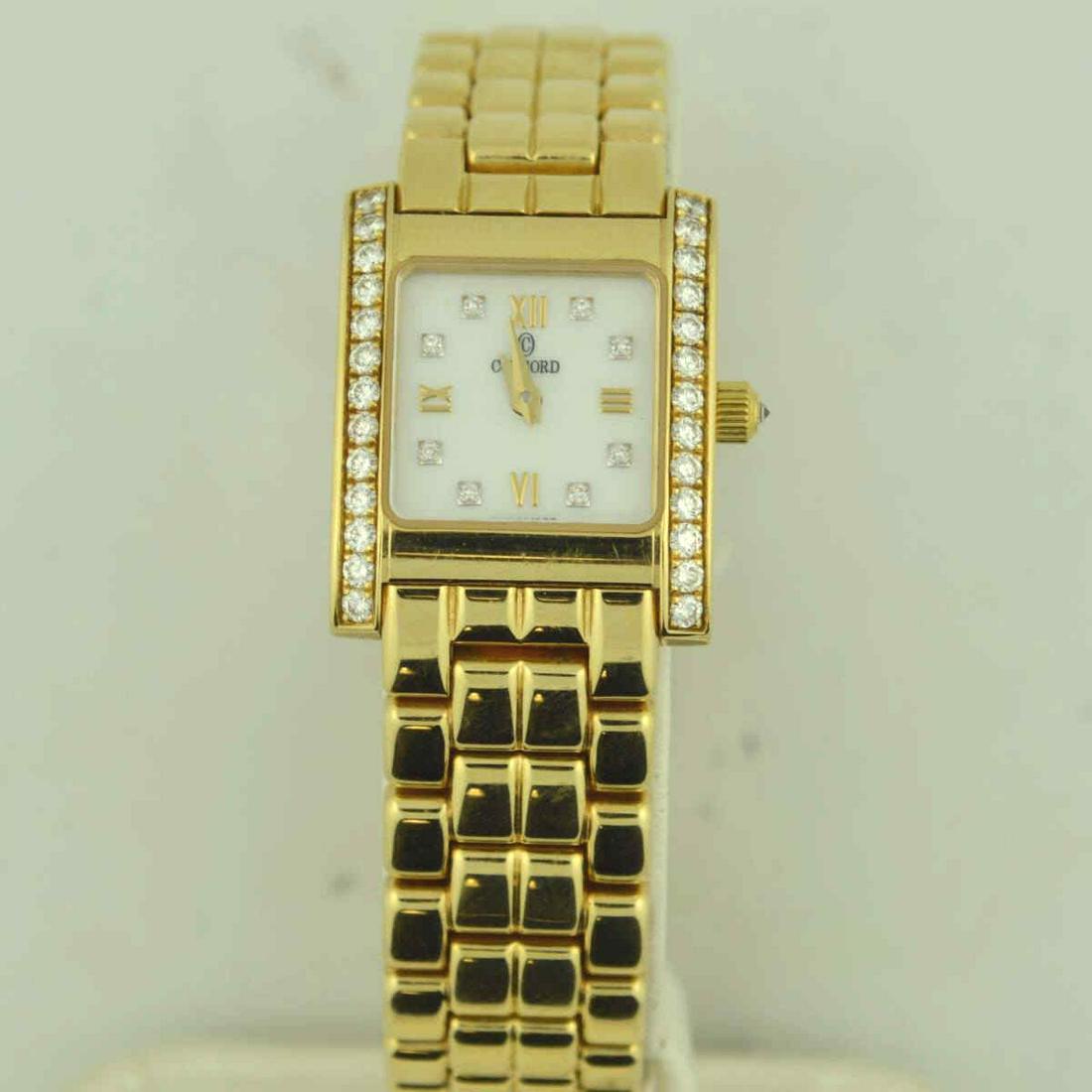 Lady's 14kt yellow gold Concord Quartz Watch: Lady's 14kt yellow gold Concord Quartz Watch with diamonds on each side of the case, mother of pearl dial with diamonds and roman numerals, and sapphire crystal. Gross weight 44.6gr.