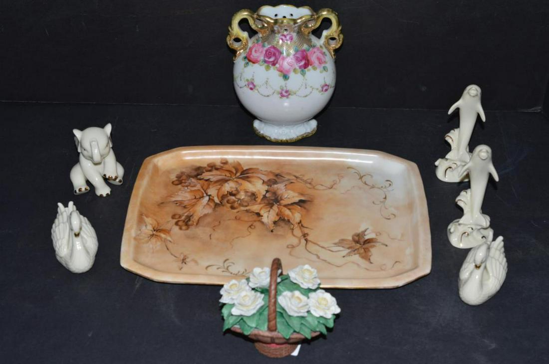Lot of 8 Great Porcelain Collectible Decor Pieces: Lot of 8 Great Porcelain Collectible Decor Pieces From Lenox, Hana, 7 Elite Works Limoges France. The group includes 5 Lenox animal figures, 2-Swans, 2-Dolphins, 1-Elephant ranging from 2 3/8" to 4" t