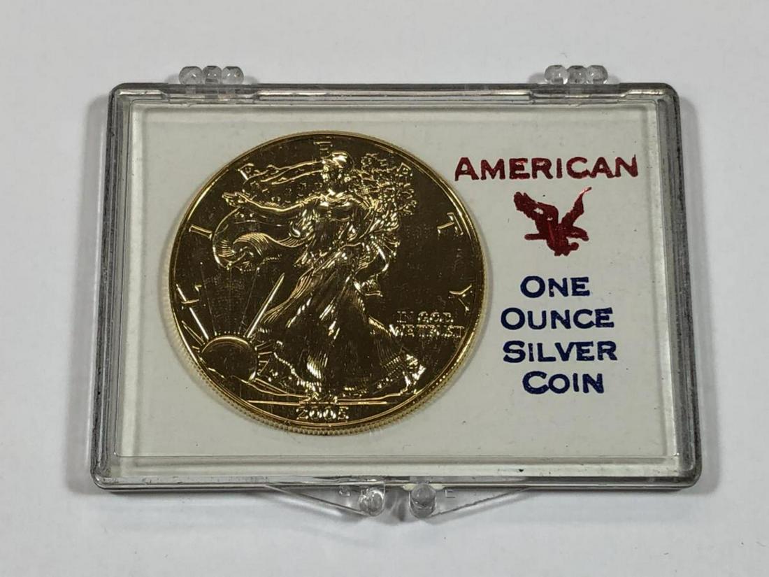 2005 Gold Plated Silver American Eagle 1-ounce: 2005 Gold Plated Silver American Eagle 1-ounce, housed in a snap-tite plastic holder.