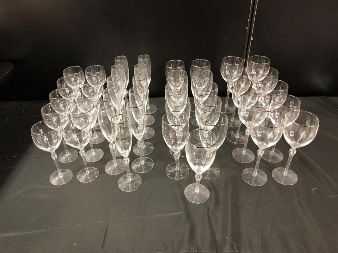 Lot Of Lenox Madison Platinum Trim Wine Glasses: Lot Of Lenox Madison Platinum Trim. Total of 42 glasses. Consists of 10 white wine standing 7 3/4" tall. 11 red wine standing 8 1/2" tall. 11 water standing 8" tall. 11 champagne flute standing 9 1/2"