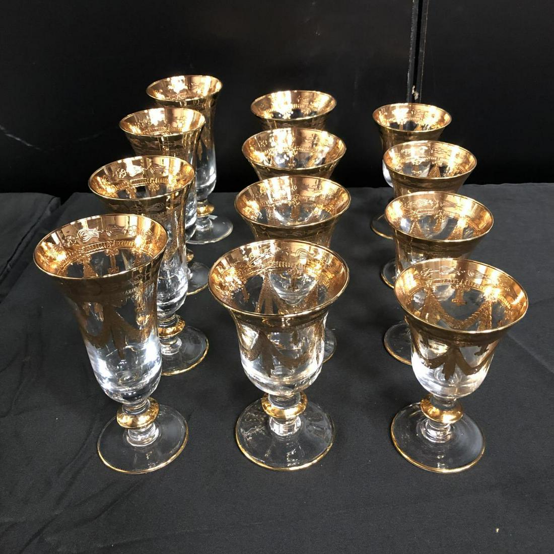Lot Of Gold Rim Wine & Water Italian Glasses: Lot Of Italian Glasses. Total of 12 glasses. Gold Rim. Consists of 4 water standing 7 1/2" tall. 4 red wine standing 6 1/2" tall. 4 white wine standing 5 1/2" tall.