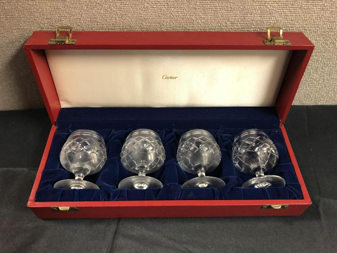 Original Cartier Box with 4 Brandy Glass Snifters: Original Cartier Presentation Box with 4 Brandy Glass Snifters. Comes with original receipt from Cartier on 5th Ave, New York. Etched Cartier on the bottom of each glass. Exquisite condition set.