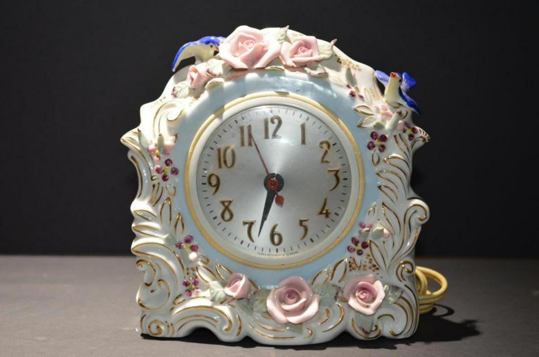 Porcelain Desk Clock of Floral Rose & Bird: Desk Clock. Porcelain clock with rose and bird decoration and Sessions movement, 6 3/4"h.
