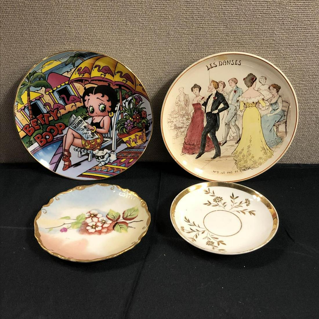 Lot Of Assorted Plates, Betty Boop, Les Danses: Lot Of Assorted Plates. Betty Boop Plate. Measures 8" across. Brandenburg Plate. Measures 6" across. Depose Creil ET Monterean Plate. Les Danses No. 3 Le Pas De Quatre. Measures 8" across. Small plate