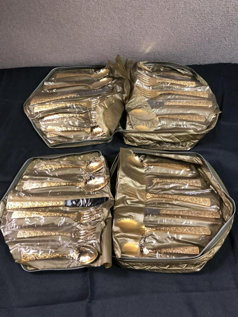 Set Of Gold Plate Flatware: Set Of Gold Plate Flatware. 2 bags with flatware. First bag consists 57 pieces. Flatware is gold plated. Consists of Knife, Dessert spoon, Soup spoon, salad fork, Dinner fork, butter knife. Second Bag