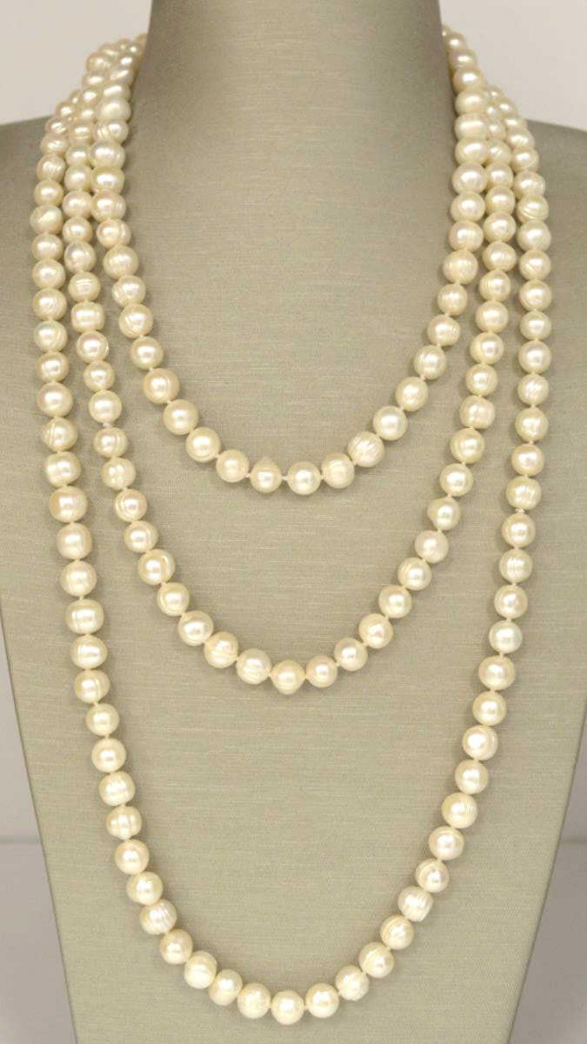 66" continuous fresh water pearl necklace: Ladies 66" continuous fresh water pearl necklace featuring single knotted 8-9mm creamy white color pearls.