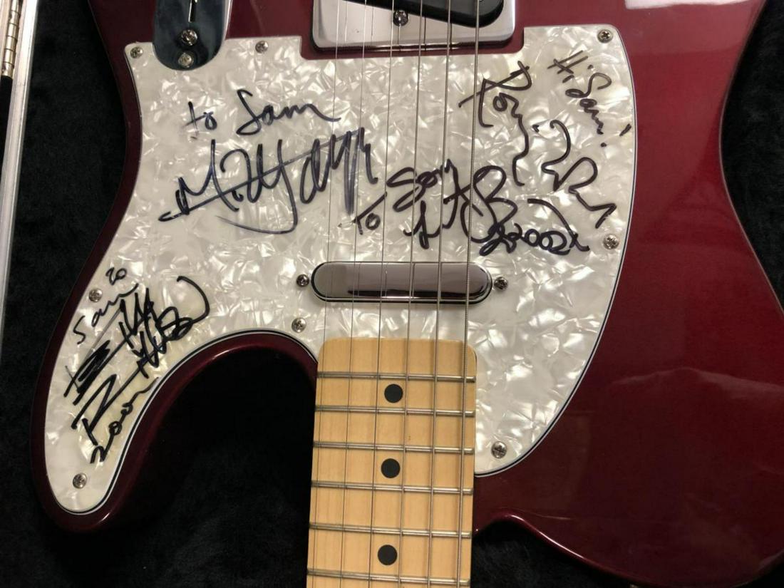 The Rolling Stones Signed Fender Telecaster Guitar: The Rolling Stones Band Signed Fender Telecaster Guitar with Hard Case. Autographed on Pickguard in 2002 by Mick Jagger, Keith Richards, Ronnie Wood, and Charlie Watts. Guitar is Made in Mexico. Seria