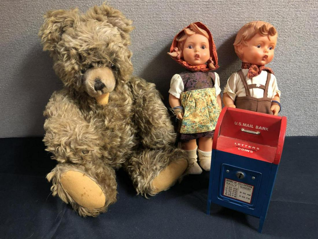 Mid Century Dolls, Teddy Bear & Coin Mailbox: Mid Century Dolls, Teddy Bear & Coin Mailbox. Boy and girl doll. Circa 1930-1960's. Made by Goebel. Both stand 11" tall. Teddy Bear arms and legs move. Stands 16" tall. U.S. Mail Bank Letters Coins. S