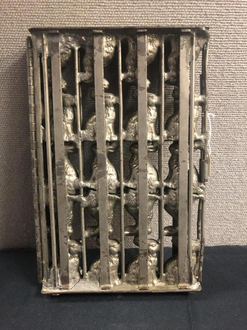 Vintage Metal Hinged Chocolate Bunny Rabbit Mold: Vintage Metal Hinged Chocolate or Candy Bunny Rabbit Mould. Stamped near the hinge "T.C. WEYGANDT CO. NEW YORK, NY" on one side, and "MADE IN GERMANY" on the other side. Makes 20 complete confectioner