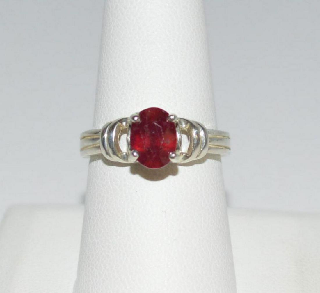 Ladies Sterling Silver Ruby Ring: Ladies sterling silver ruby ring featuring a prong set, oval cut ruby. Weighing approx. 6.06ct. Ring Size 8. Weight 4.3 gr. TH-558