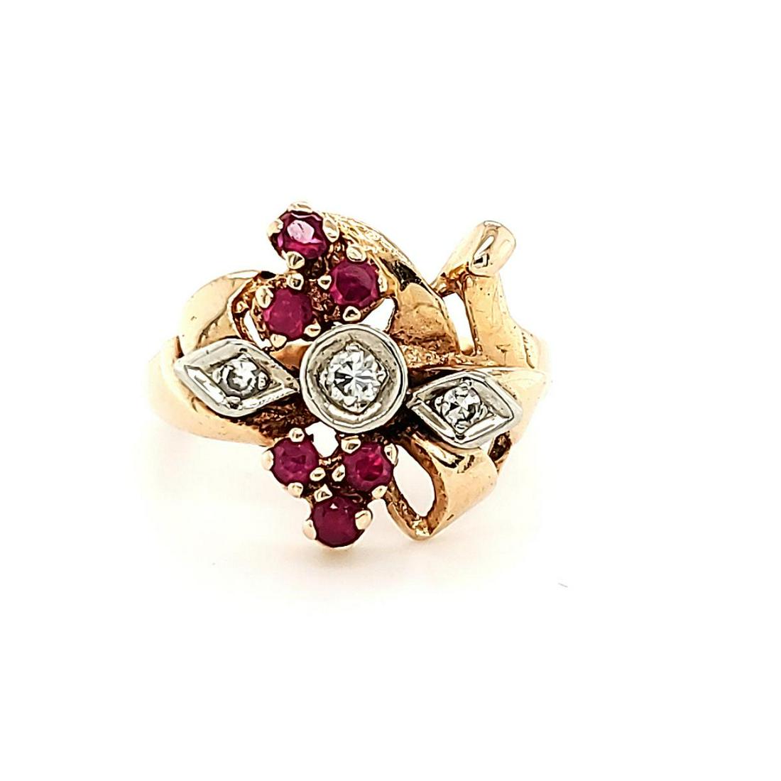 Lady's 14kt rose gold Retro ruby and diamond ring: Lady's 14kt rose gold Retro ruby and diamond ring approx .10Ctw diamonds. Weight 4.5gr. Finger Size 7.