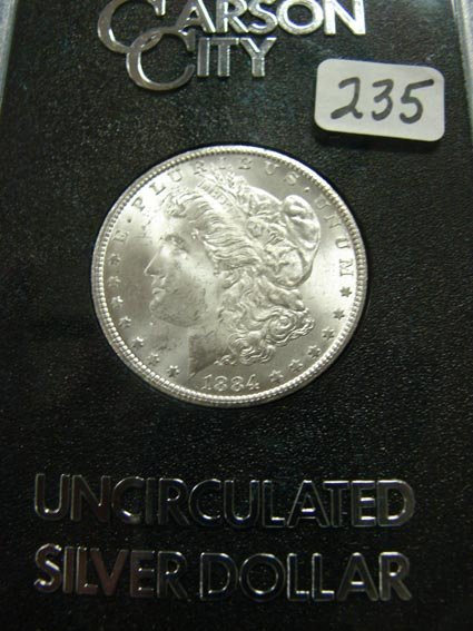 1884-CC Morgan Silver Dollar in GSA Holder MS 63
