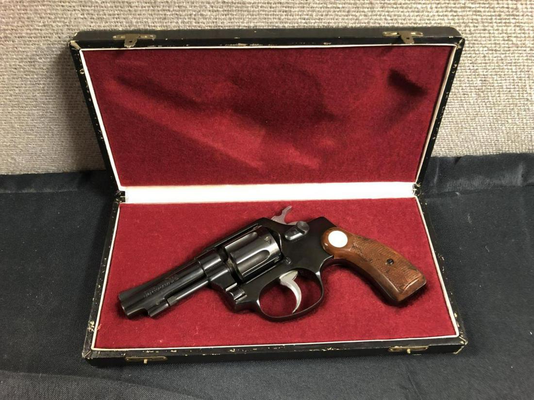 Rossi 3" Blue .32 Long 6 Shot Revolver in Box: Rossi 3" Blue .32 Long Caliber 6 Shot Revolver in Original Box with Bakelite Grips on Square Butt, Unshrouded Barrel, with Improved Drop Out Cylinder Latch. Great condition. Marked inside drop out #66