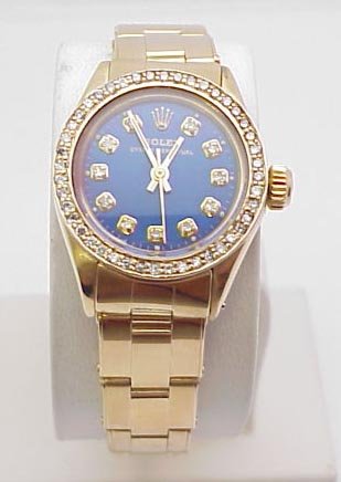 Lady's 18 kt Yellow Gold Rolex Diamond Bezel