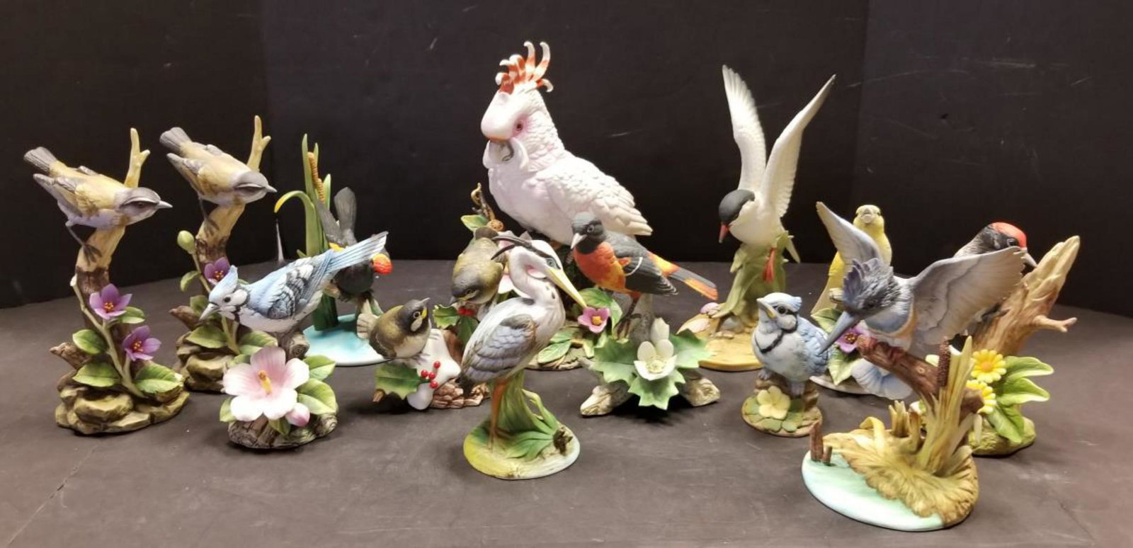 Lot of 13 Porcelain Ceramic Birds Andrea by Sadek: Lot of 13 Porcelain Ceramic Birds Andrea by Sadek Made in Japan. The range from 3.75" to 10.25" tall. The great group includes: Blue Jay (chick or baby)#6350, Chickadees #6726 from 1983, Blue Heron #6
