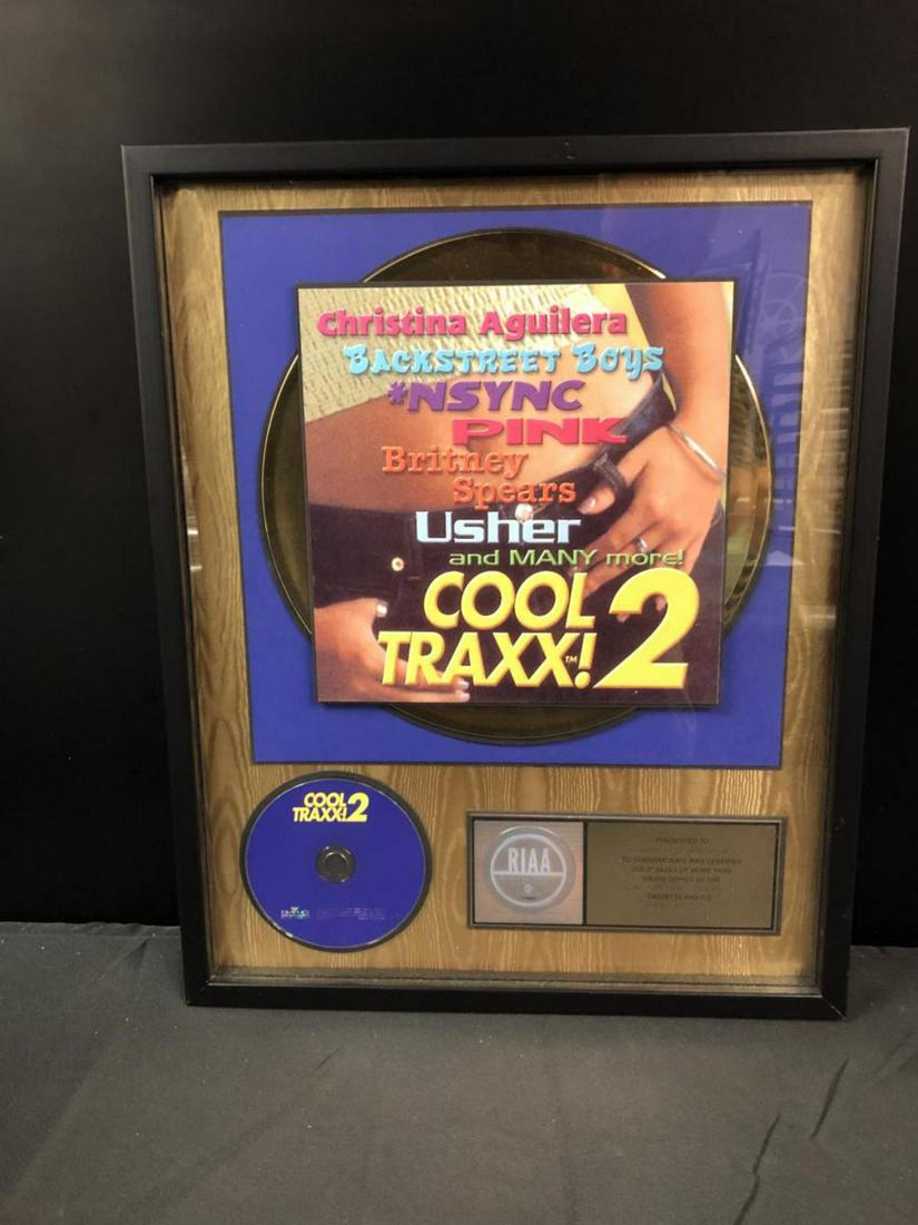 Framed Cool Traxx! 2 Gold Sales Award Plaque: Framed Cool Traxx! 2 Gold Sales Award Plaque Commemorating the Sale of 500,000 Units Certified by RIAA. Cool Traxx! 2 was released in 2000 by BMG Special Products & featured major artists including: N