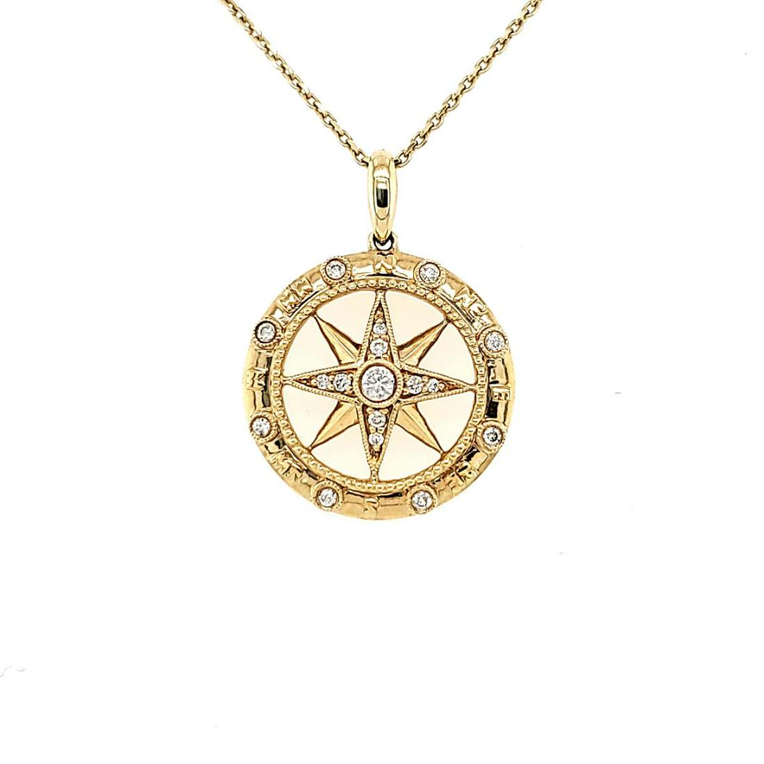 14kt yellow gold diamond compass necklace: Ladies 14kt yellow gold diamond compass necklace featuring a round compass rose pendant accented with prong set round diamonds weighing approx. 0.13ct. Hanging from an 18" adjustable chain. Weight 4.1