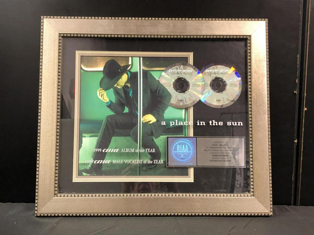 Framed Tim McGraw A Place In The Sun Portrait: Framed Tim McGraw A Place In The Sun Portrait. To Commemorate RIAA Certified Multi-Platinum Sales Of More Than 2,000,000 Copies Of The CURB RECORDS Cassette And CD " A Place In The Sun". RIAA Recordin