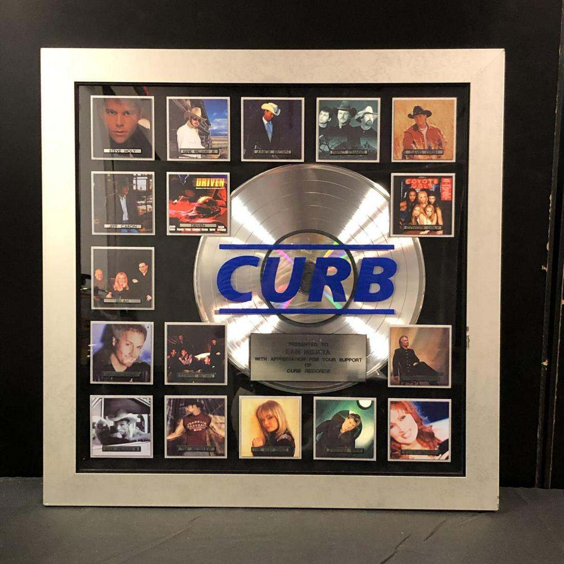 Curb Records Presentation Appreciation Plaque: Curb Records Presentation Appreciation Plaque. This framed award features over one dozen Curb Records recording artist including: Lee Ann Rimes, Jo Dee Messina, Tim McGraw, Hank Williams Jr., Sawyer B