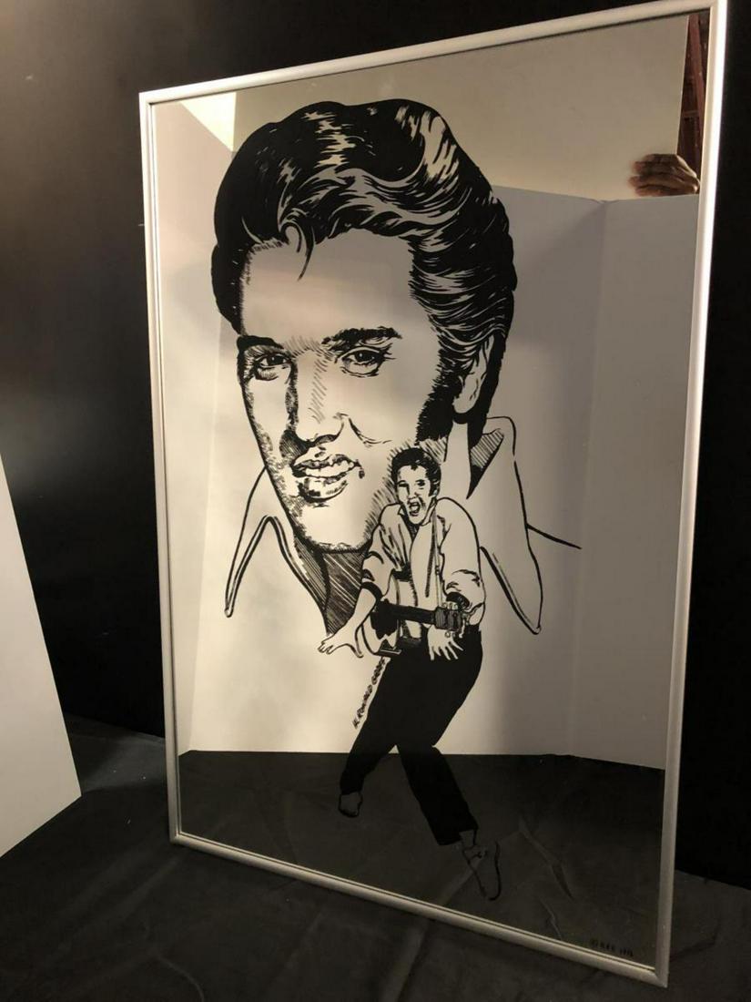 Framed Elvis Presley Mirror: Framed Elvis Presley Mirror. H. Ronald Graff written next to Elvis playing a guitar in the background. Also in the background is the face of Elvis. H.R.G 1976 in the lower right hand corner. Measures
