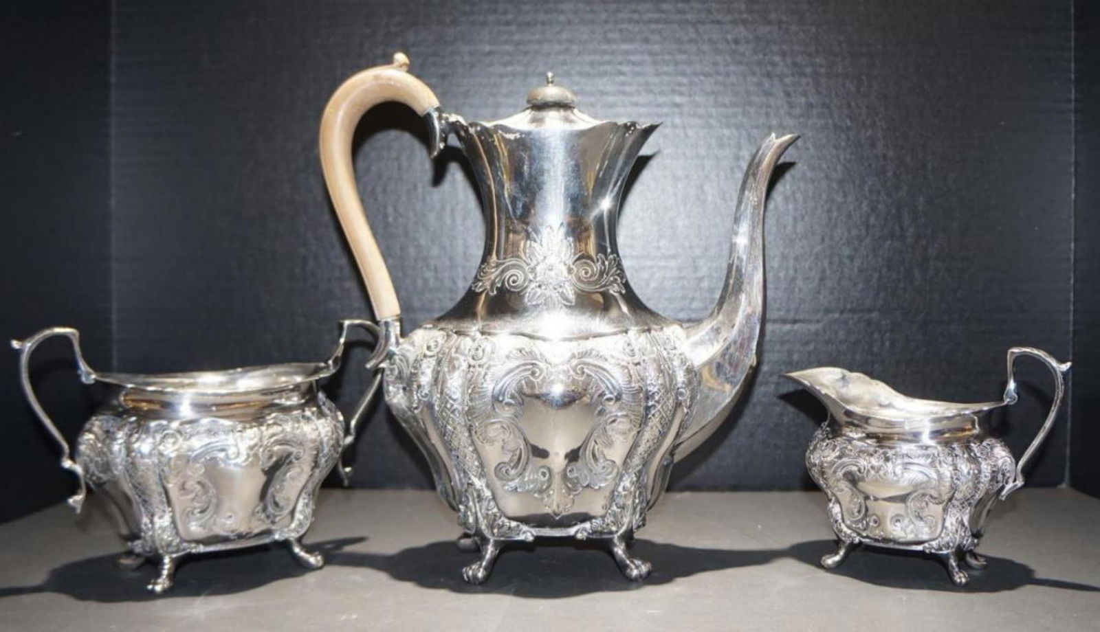 Set Of Vintage Silver Plated Tea Set: Set Of Vintage Silver Plated Tea Set, tea pot has wood handle and ebony knob on lid.