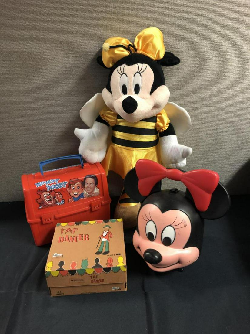 Lot Of Walt Disney & Howdy Doody Collectibles: Lot Of Various Walt Disney Collectibles. Consists Of Minnie Mouse Box with Handle. A Doll Of Minnie Mouse in a Bee Outfit standing 21" tall. Howdy Doody Lunch Box. Sammy Tin Tap Dance Entertainer 1925